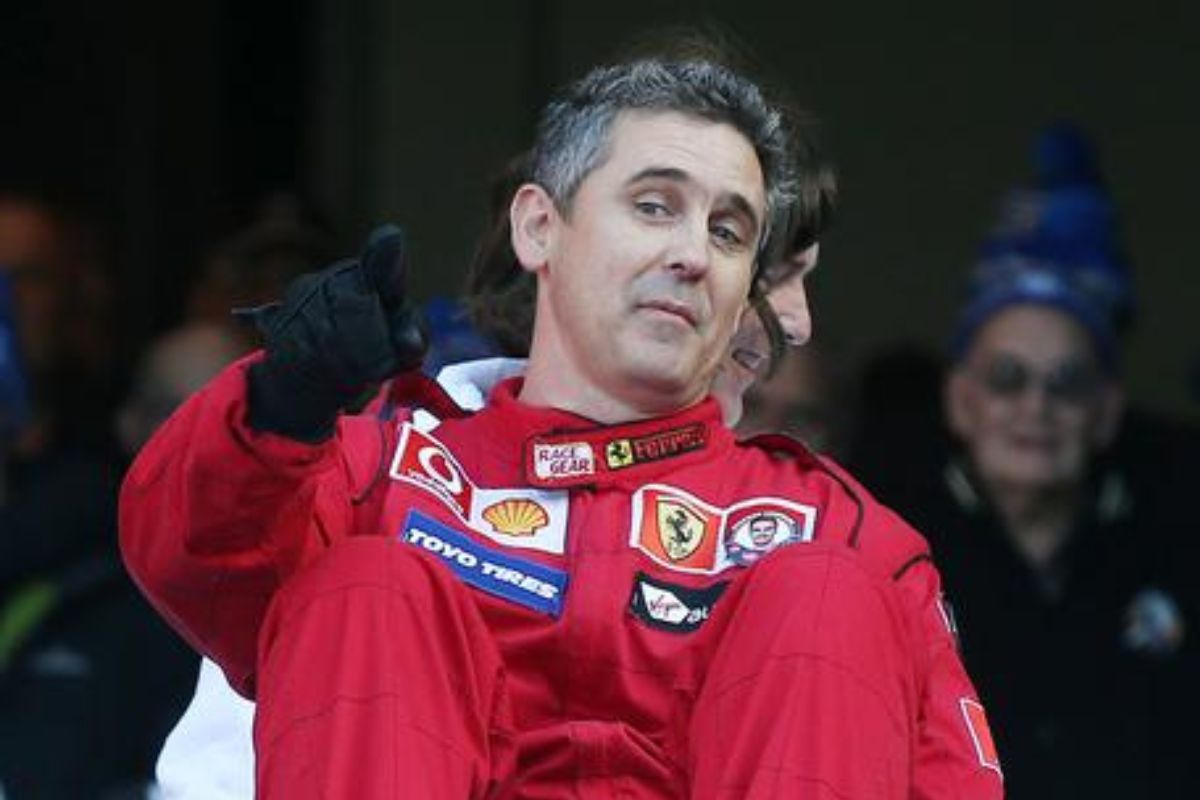 Leon Cameron dressed in a Ferrari racing suit